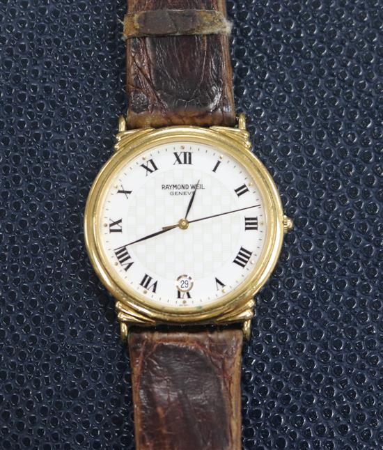 A gentlemans Raymond Weil gold plated and steel quartz wrist watch.